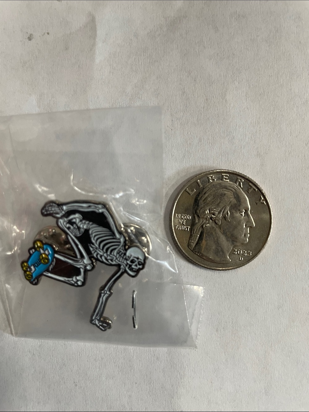 Skeleton Skateboard Enamel Pin - Black and Blue